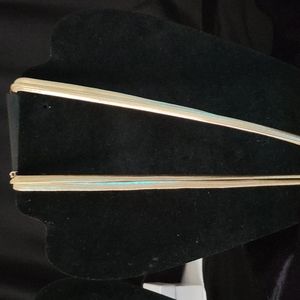 Gold toned snake chained necklace